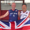 Photo of Mark and GB team mate holding Union Jack flag