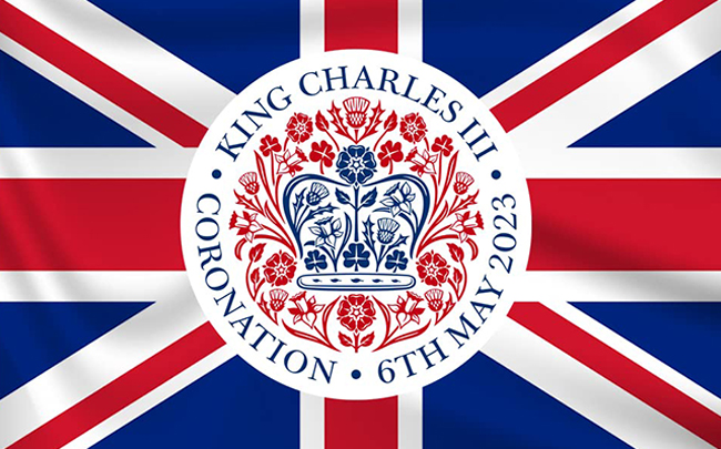 Image of union jack flag with King Charles III coronation emblem