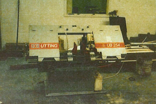 Archive footage of High Peak Steels cutting saw